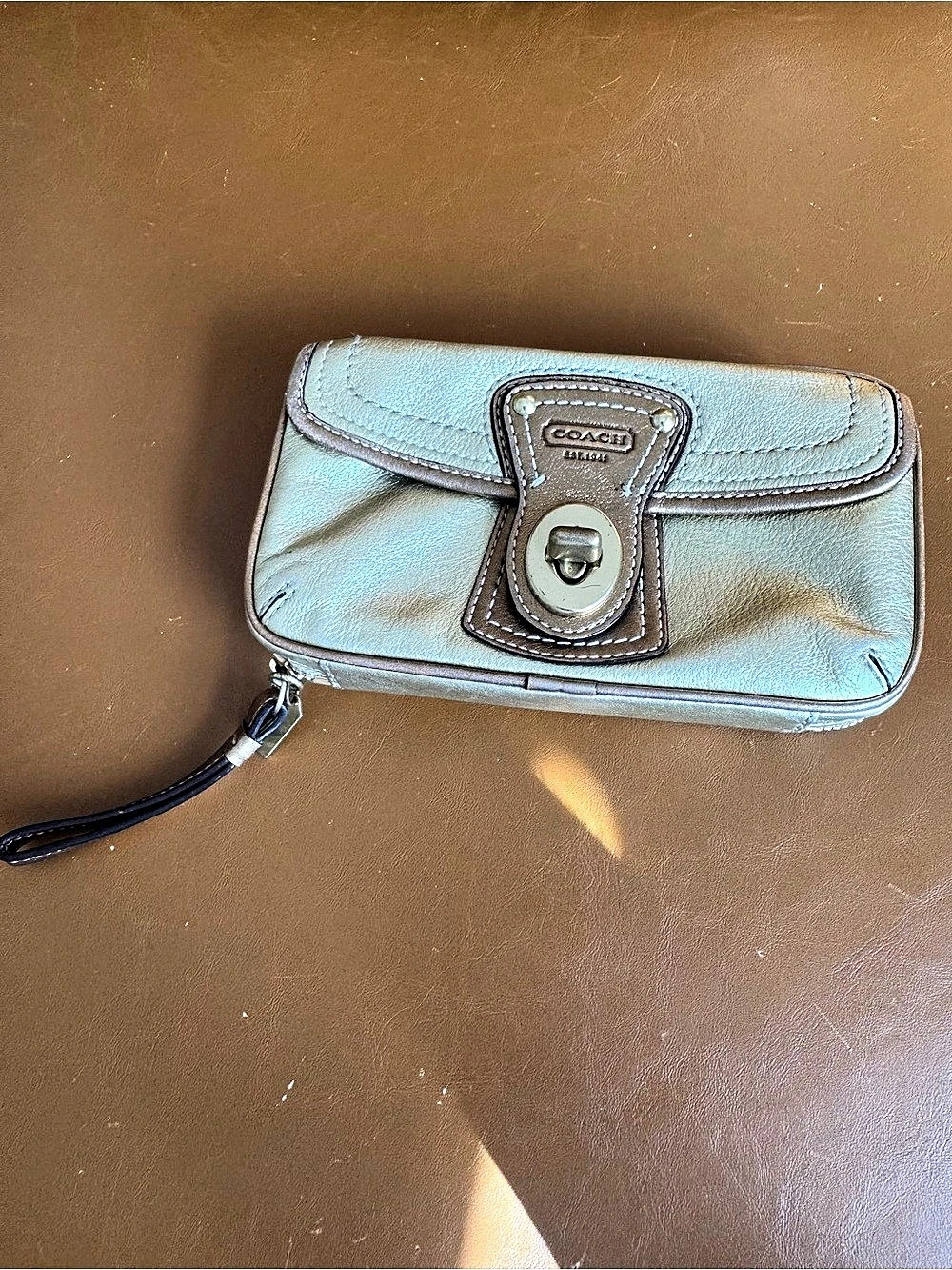 gold turnlock vintage Coach clutch